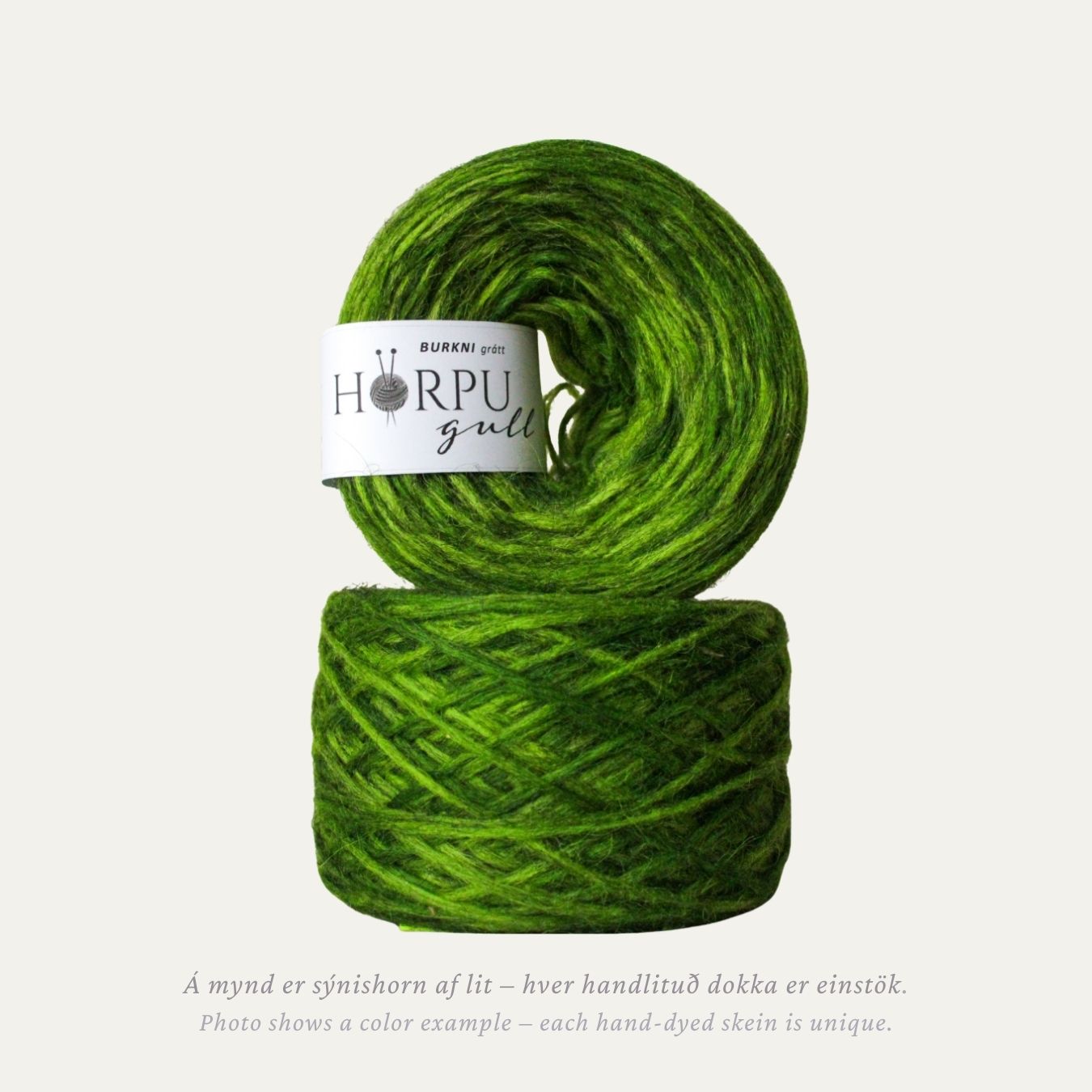 Hand-dyed Icelandic lopi yarn inspired by male fern in vibrant green tones with a natural grey base