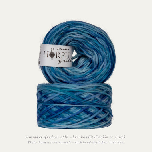 Hand-dyed Icelandic lopi yarn inspired by alpine sea holly in cool blue tones