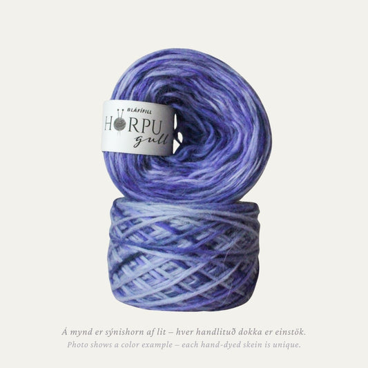 Hand-dyed Icelandic lopi yarn inspired by alpine blue sow thistle in cool blue and violet tones
