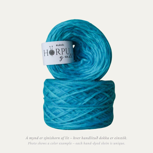 Hand-dyed Icelandic lopi yarn inspired by Himalayan blue poppy in clear light blue tones