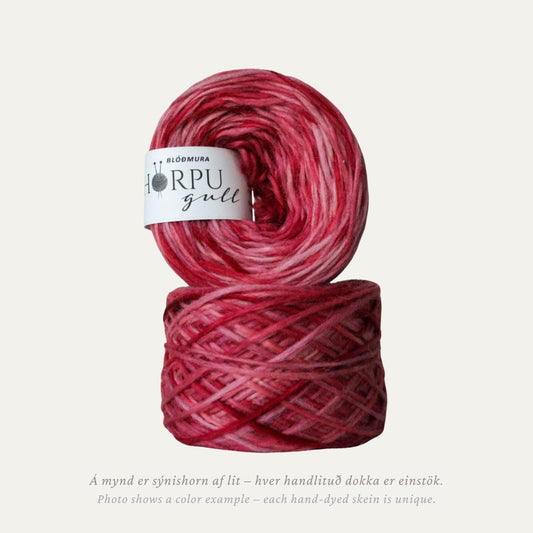 Hand-dyed Icelandic lopi yarn inspired by Nepal cinquefoil in deep red tones
