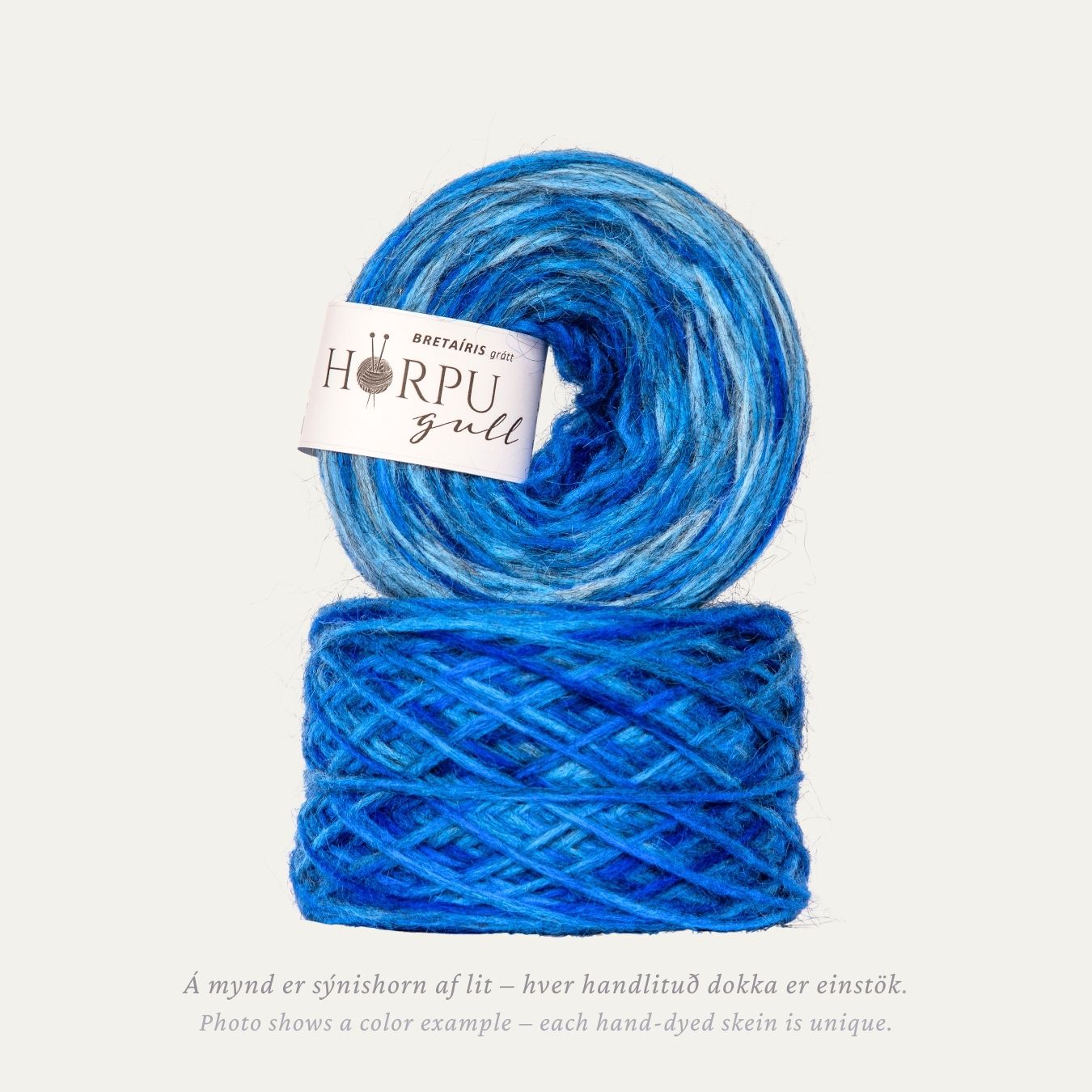 Hand-dyed Icelandic lopi yarn inspired by iris in deep blue tones with a natural grey base