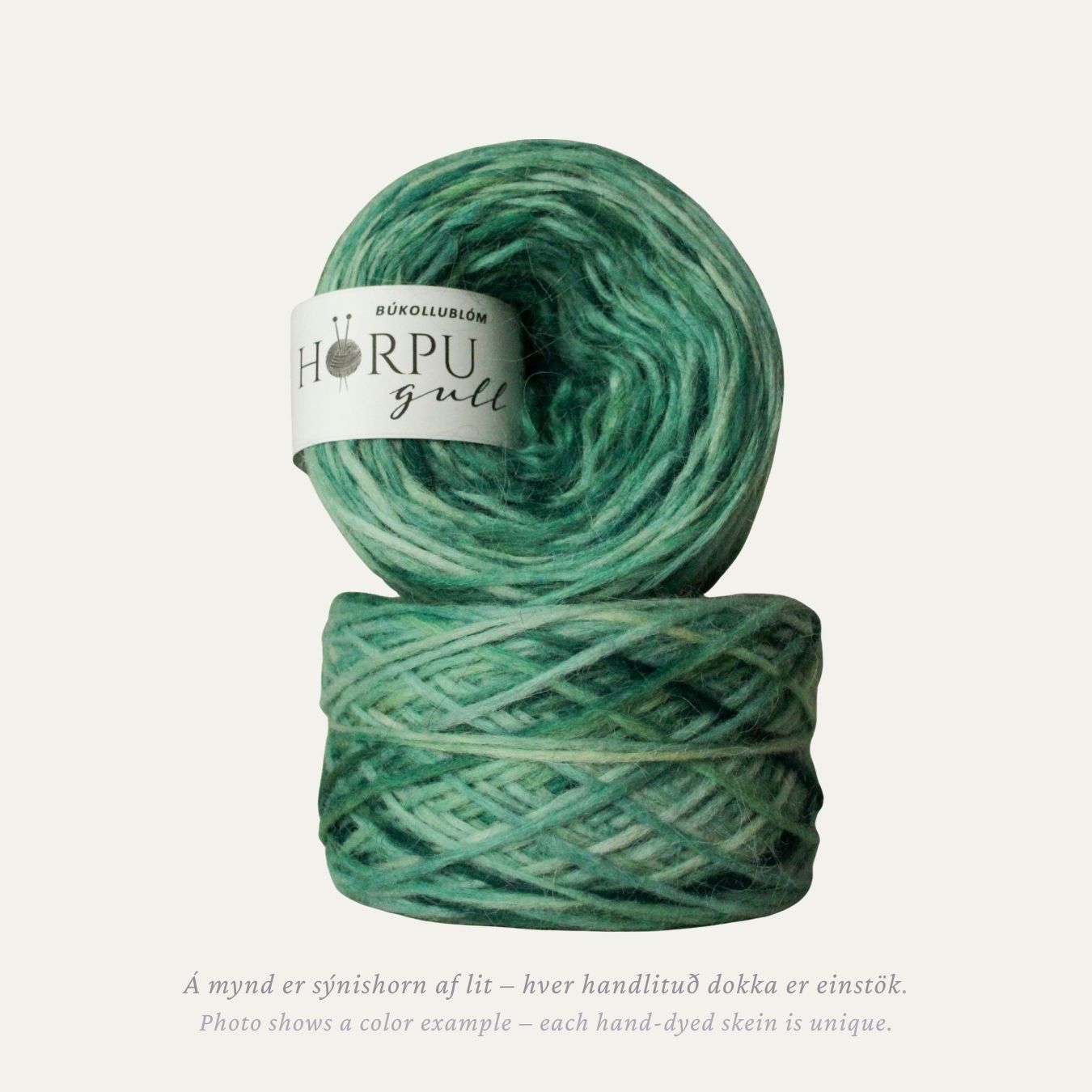 Hand-dyed Icelandic lopi yarn inspired by largeleaf brunnera in soft green and blue tones