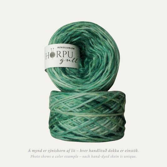 Hand-dyed Icelandic lopi yarn inspired by largeleaf brunnera in soft green and blue tones