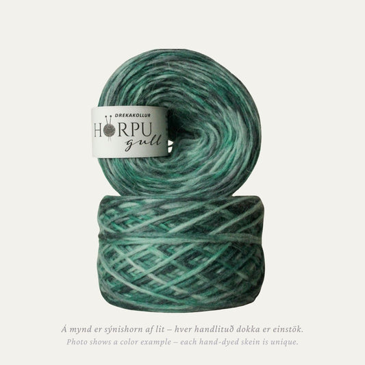 Hand-dyed Icelandic lopi yarn inspired by dragon’s head in deep green-blue tones