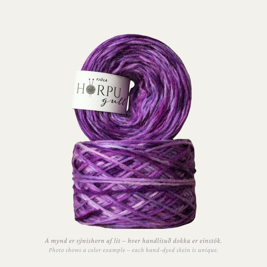 Hand-dyed Icelandic lopi yarn in rich purple tones inspired by wild pansy flowers
