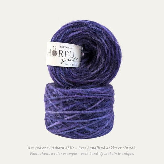 Hand-dyed Icelandic lopi yarn inspired by Nootka lupine flowers in deep purple tones with a natural grey base