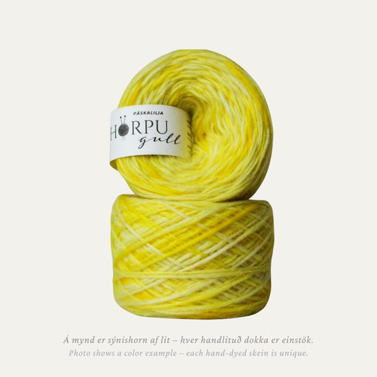 Hand-dyed Icelandic lopi yarn in soft pastel yellow tones inspired by daffodil flowers