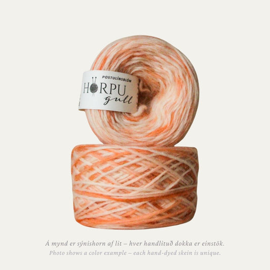Hand-dyed Icelandic lopi yarn inspired by London Pride in soft peach tones