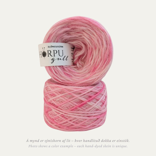 Hand-dyed Icelandic lopi yarn inspired by bistort in soft light pink tones