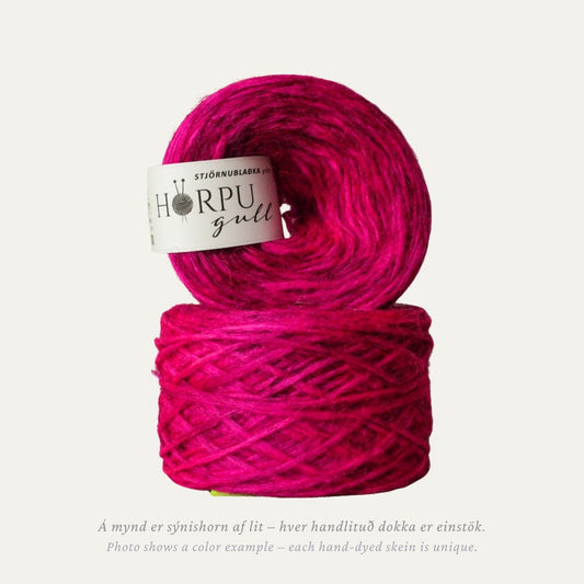 Stjörnublaðka hand-dyed Icelandic lopi yarn in vibrant pink tones dyed on natural grey wool base
