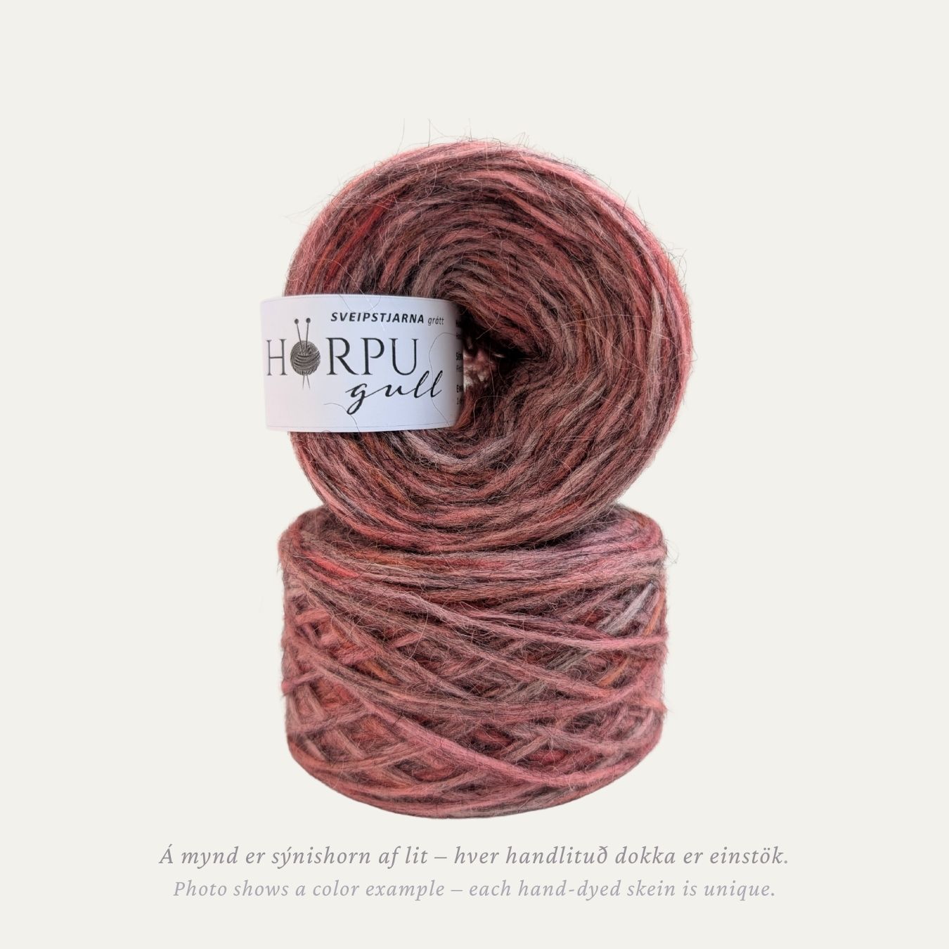 Sveipstjarna hand-dyed Icelandic lopi yarn in pink tones dyed on natural grey wool base for added depth and texture