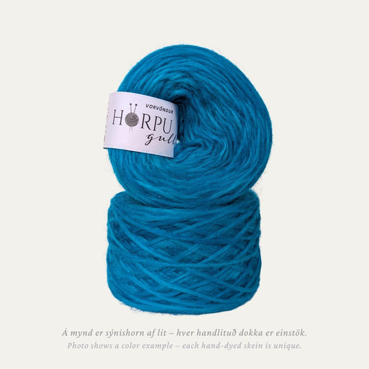Hand-dyed Icelandic lopi yarn in bright clear blue tones inspired by spring gentian flowers